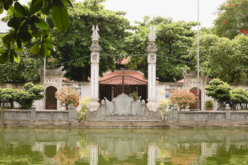 The ancient Van Phuc Communal House captivates visitors upon entering Van Phuc Silk Village